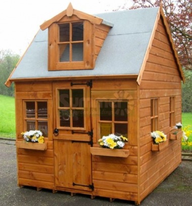 wooden playhouse with upstairs